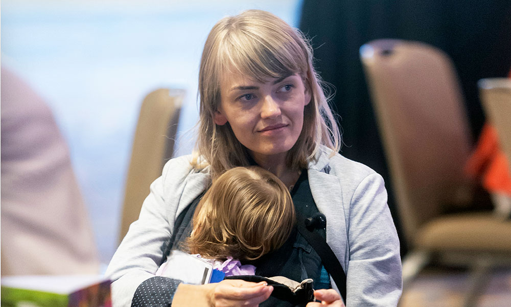 Woman with her child at an SPIE event