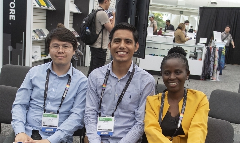 Student Members enjoying a photo moment at an SPIE conference