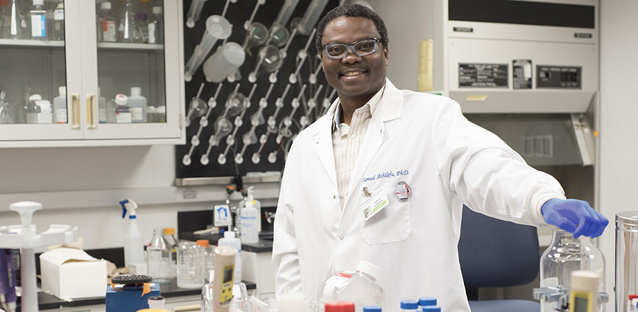 Samuel Achilefu in his lab at Washington University School of Medicine