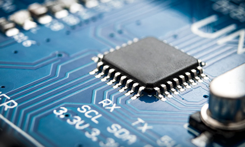 Close view of a microchip using optoelectronics research