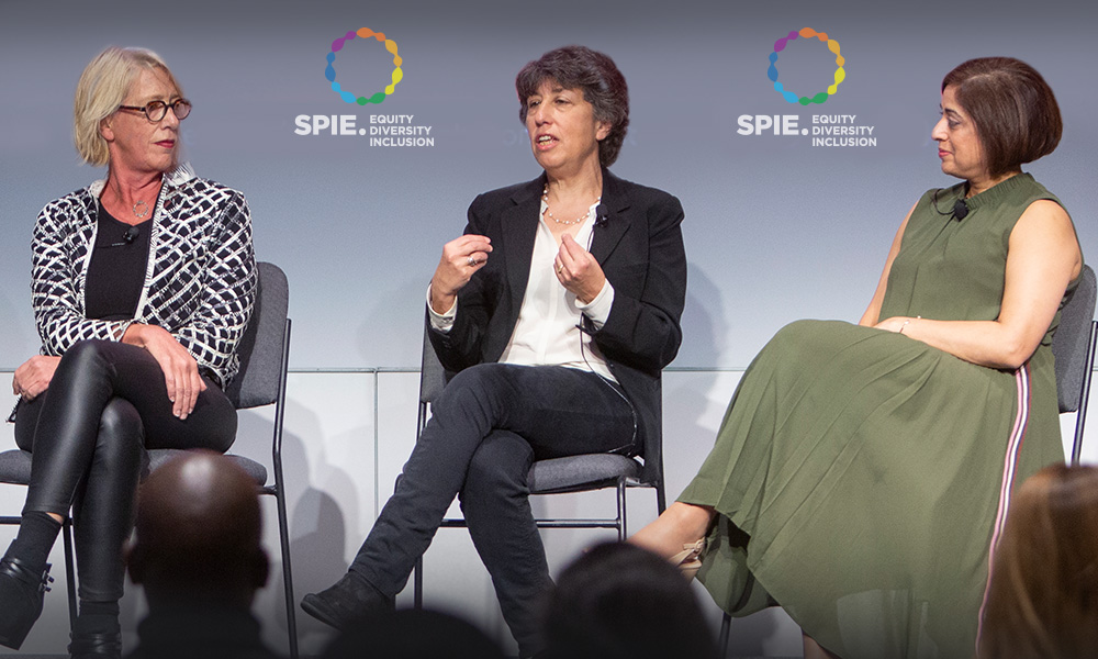 Three women, part of a panel discussion