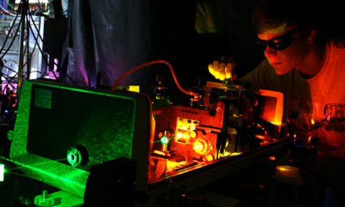 A picture of a man in a laser lab