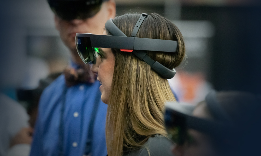 SPIE AR | VR | MR event attendee using new XR technology