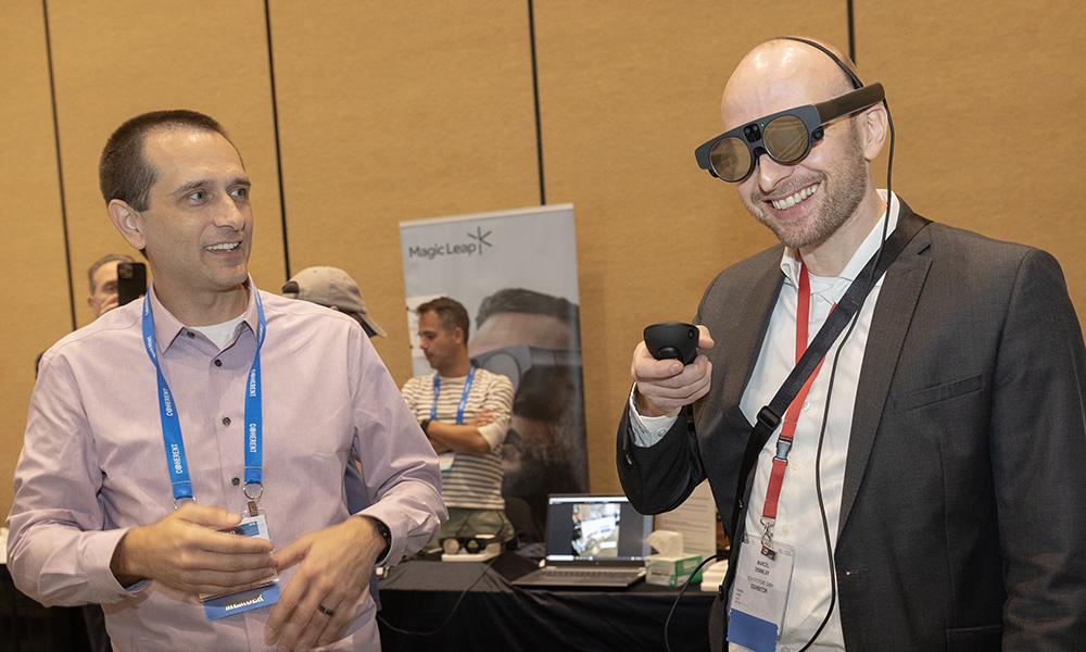 Exhibit hall attendees interact at SPIE event