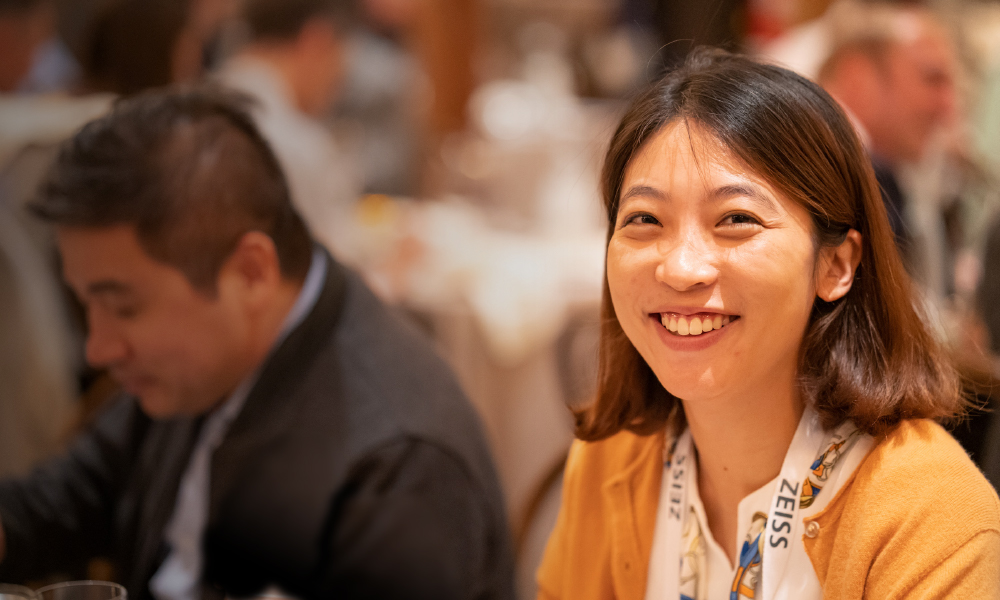 Smiling attendee at an SPIE event