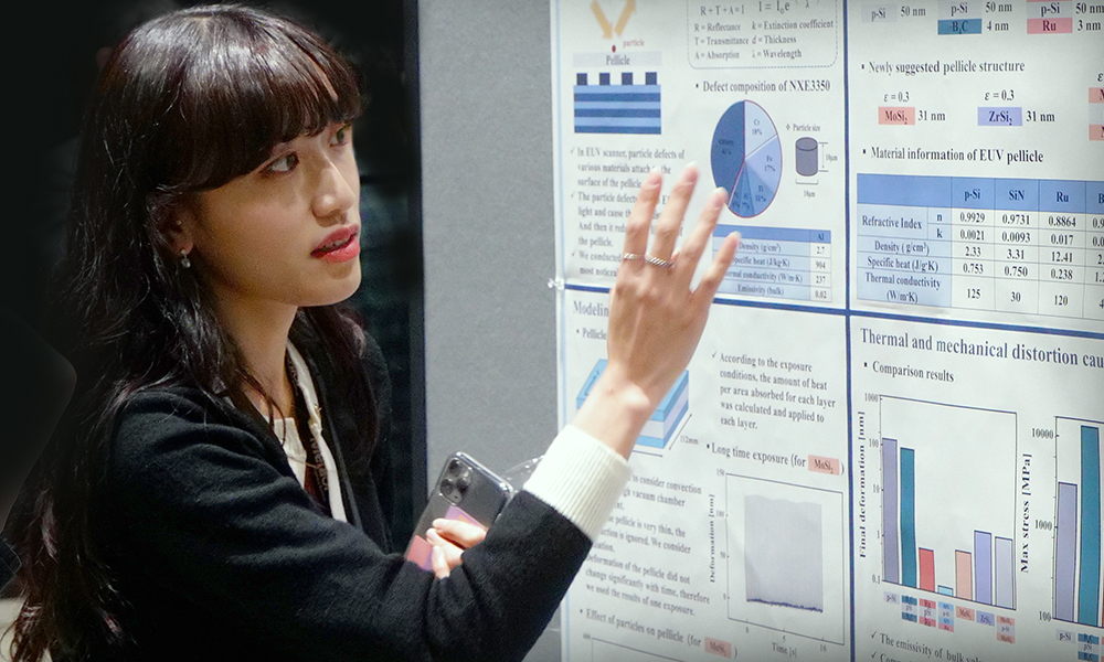 Poster presenter explains her research at the conference