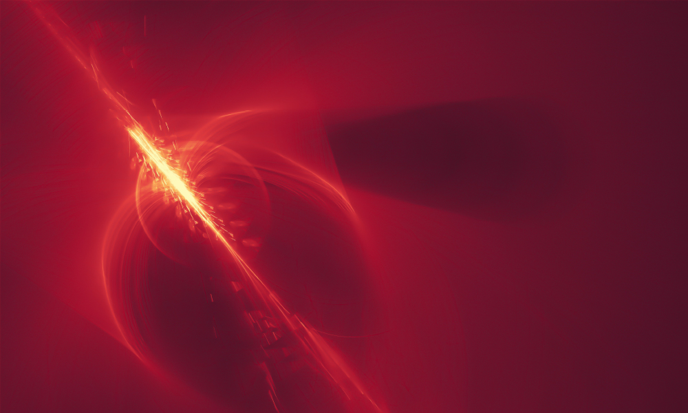 A laser pierces a cell in a sea of red light
