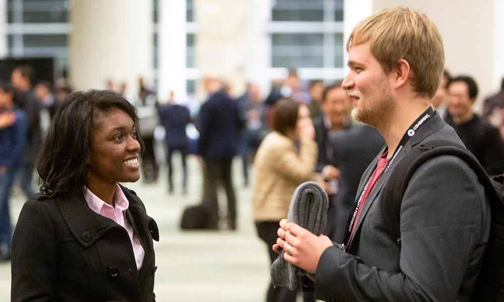 Attendees converse at SPIE event