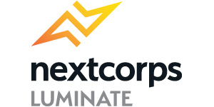 Logo: NextCorps Luminate 