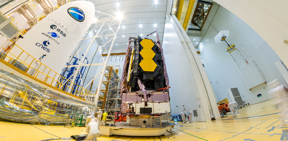 The James Webb Space Telescope being placed on top of the Ariane 5 rocket